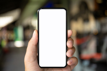 man hand holding phone with isolated screen on background city