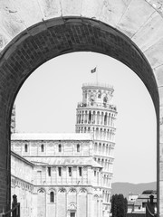 Leaning Tower in Pisa, Torre pendente di Pisa. View through arch of New Gate, Porta Nuova. Tuscany,...