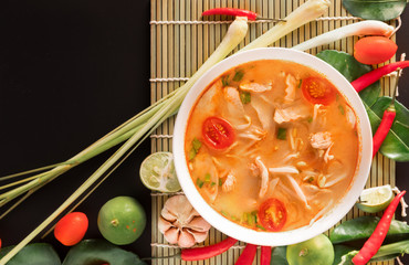 Tom Yum Gai or spicy tom yum soup with chicken - Authentic Thai style food. With ingredients:...