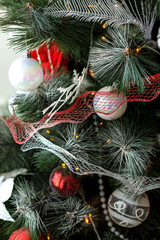 Christmas toys hanging on the tree beautiful holiday decor