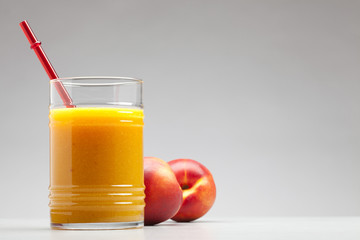 peach juice in glass