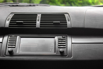 Obraz na płótnie Canvas Vehicle on-board computer. Car interior details