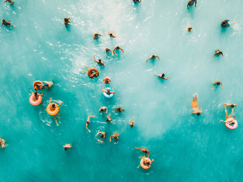 Aerial Summer View Of Clear Ocean Water Full Of Tourists