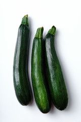 Top view of zucchini on white background