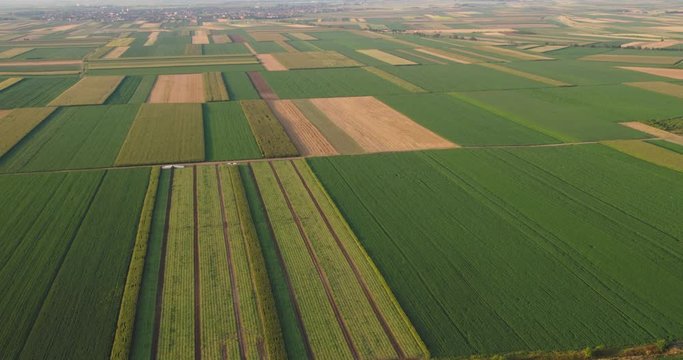 Aerial shot of agricultural farms and fields.