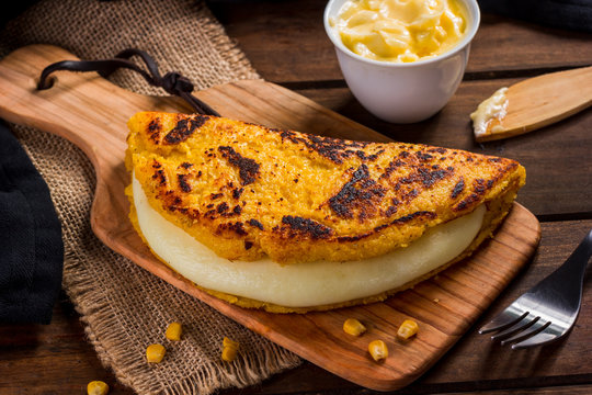 Cachapa with cheese, typical Venezuelan dish made with corn, cheese and butter