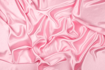 Pink luxury satin fabric texture for background