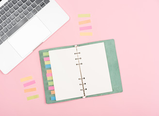 notebook on pink background