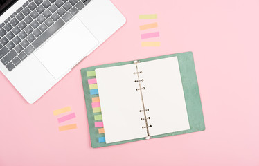 notebook on pink background
