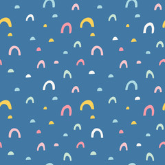 Hand drawn geometric abstract pattern. Cute rainbow arc vector seamless background in doodle style. Bright colors. Semi circle doodle shape.