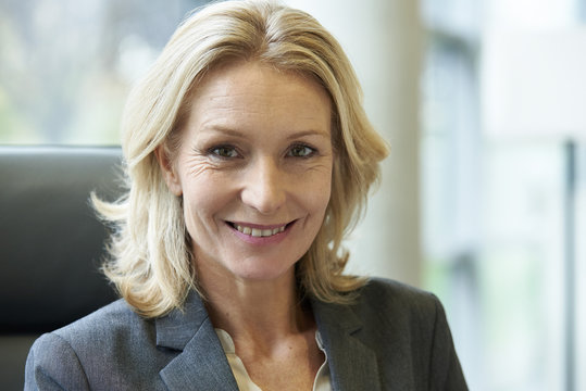 Close-up of businesswoman smiling