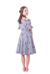 Fototapeta premium Portrait of a beautiful smiling young Asian woman standing on white