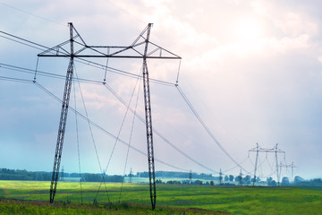 Pylon and transmission power line on sky background. Electrical line power concept.
