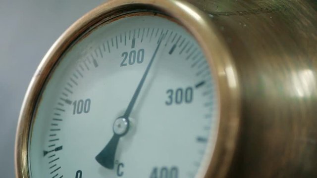 thermometer on the oven. oven in the kitchen in the restaurant