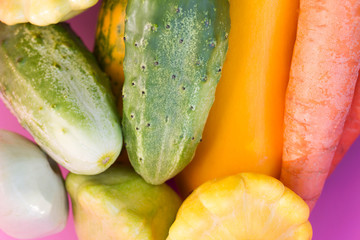 Zucchini, squash, cucumber, carrot close-up, background. top view