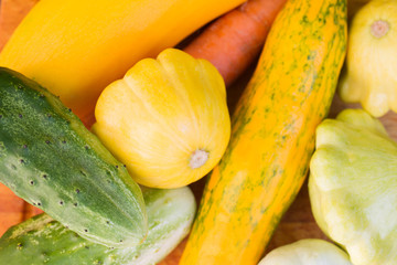 Zucchini, squash, cucumber, carrot close-up, background. top view