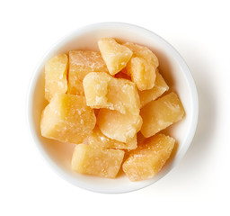 Bowl of parmesan cheese isolated on white background