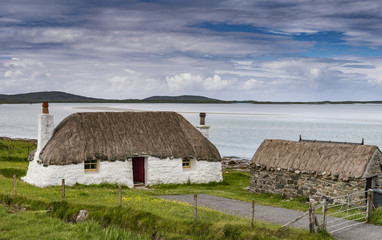 A thatched black house at Malacleit on the Isle of North uist © Richard
