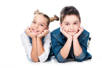 two classmates resting chins on hands isolated on white