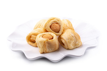Tasty mini sausage in Fresh hot crusty bread rolls isolated on white
