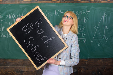 Hiring teachers for new school year. Woman teacher holds blackboard inscription back to school. Looking committed teacher complement qualified workforce educators. Back to school teachers recruitment