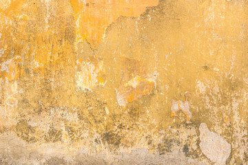 Old vintage grungy plaster painted wall texture background