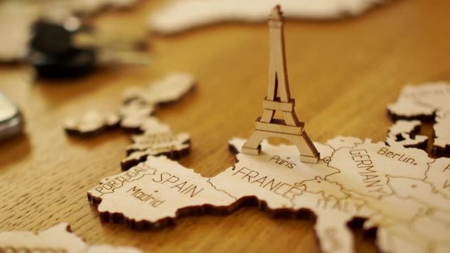 Map of Europe, France, wooden model. Eiffel Tower. Tourist attractions, travel planning