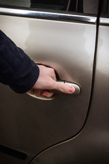 Opening car door, Man hand opening car door, close up