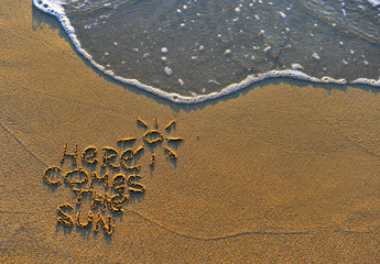 Here comes the sun beach sign
