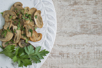 Mushrooms cooked in olive oil, parsley and garlic.