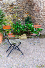 beautiful garden with chairs