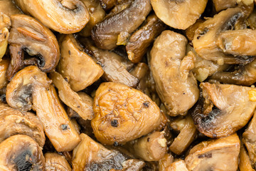 Overhead closeup view of savory cooked mushrooms