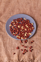 walnut peanut. peanuts for food textures. peanut harvest. fried peanuts. texture of the nuts. Nuts on the food dish. Selective focus