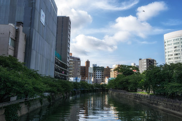 Fototapeta na wymiar fukuoka naka river reflections