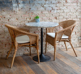 wooden tables and chairs look old and antique brown.