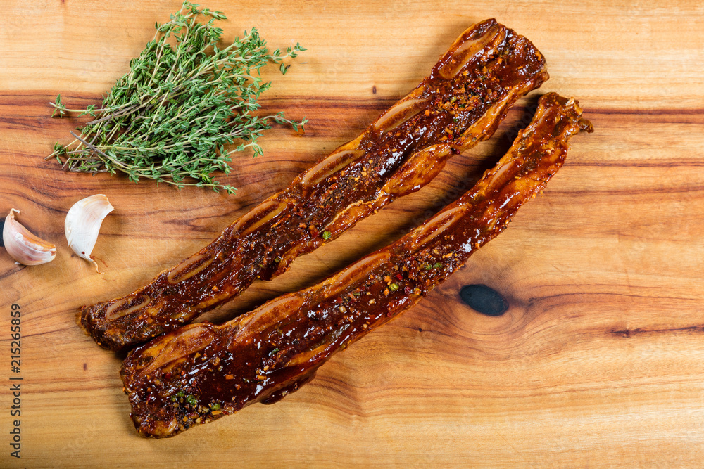 Wall mural raw beef ribs on chopping board