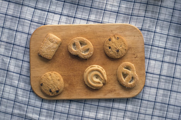 cookie on an old wooden board on the table