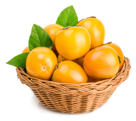 persimmons in basket on white background
