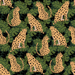 Cheetah with monstera leaves seamless pattern. Summer paradise in tropical jungles with wild animals, and fantastic florals. © lidiebug