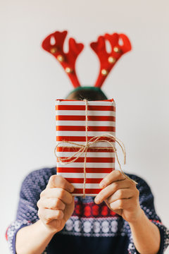 Woman holding a christmas present