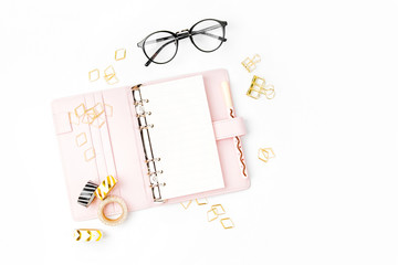 Pink planner with Business Stationery concept. Flat lay, top view