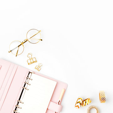 Pink planner with Business Stationery concept. Flat lay, top view
