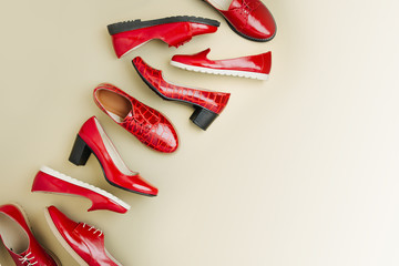 Stylish female spring or autumn shoes in red colors. Beauty and fashion concept. Flat lay, top view © igishevamaria