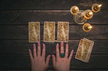 Tarot cards on fortune teller desk table background. Futune reading concept. Divination.