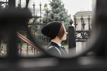 Young woman with black wool hat outdoor