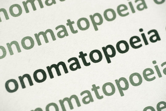 word onomatopoeia printed on paper macro