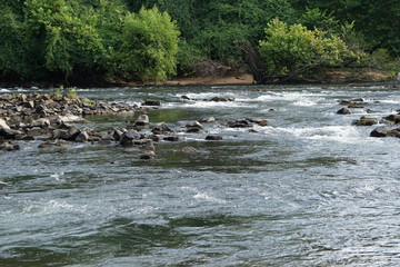 In one morning with sunrise at the river , view along the walking trail by the Oconee river park , Milledgeville GA USA