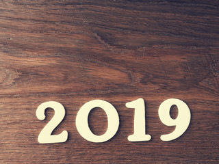 Wooden 2019 on rustic wood