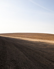 Fototapeta na wymiar Ploughed field in Ukraine