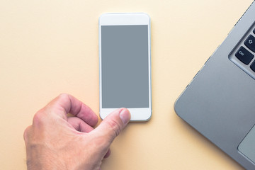 Smartphone mock up screen and laptop computer